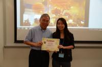 Ms. Janis CHING, one of the 2nd Prize-winners receives the certificate from Prof. Chan Wai-yee
